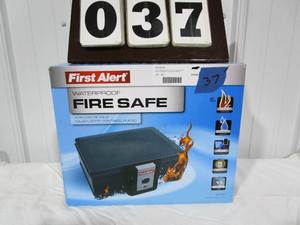 lot 37 image: First Alert Security Safe Model #2013F
