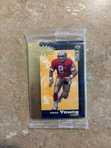 lot 197 image: Upper Deck Collectors Choice Crash NFL Legends Trading Card Set Featuring Steve Young