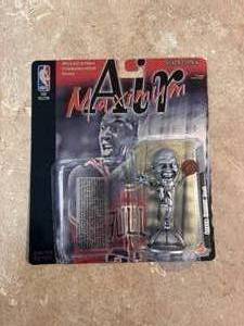 lot 208 image: Maximum Air Michael Jordan Silver Edition Statue, Comes With Cardstock Back, But Statue is not attached
