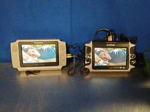 lot 15 image: Curtis Portable DVD player with 2 Screens