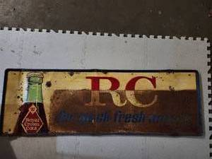 lot 100 image: Vintage Embossed RC Cola Metal Sign 46 x 16