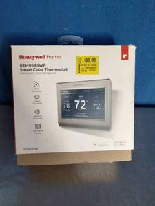 lot 64 image: Honeywell Home Wi-Fi Smart Color Thermostat.