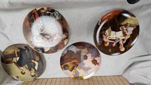 lot 17 image: Set of 4 Norman Rockwell Collector Plates
