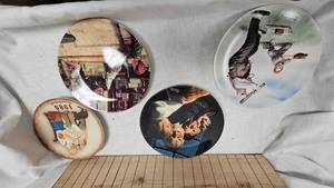 lot 19 image: Set of 4 Norman Rockwell Collector Plates