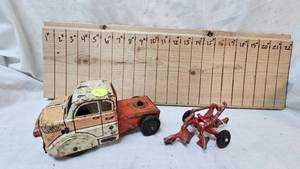lot 3 image: Cast Arcade 2 bottom plow toy, Marx Litho Toy Truck