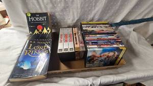 lot 42 image: Lot of DVDs, VHS, and Books as shown