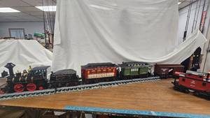 lot 46 image: Jim Beam Decanter Train Set, Engine, Passenger Car, Dining Car, Baggage Car, Baggage Car, Box Car, Coal Car, Caboose, and Track