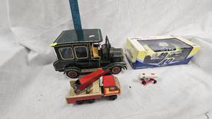 lot 69 image: Schwans Racing 124 Model, Tin Lith Sedan and Misc Toys