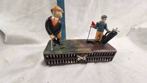 lot 70A image: Cast Iron Golfing Coin Bank