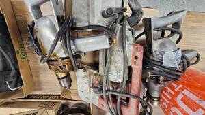 lot 142 image: Milwaukee Portable Band Saw and 2 Homelite Drills