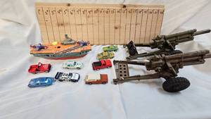 lot 165 image: Misc Die Cast Cars, Military Cannon Plastic Replicas, Made in Japan Tin Lith Aircraft Carrier