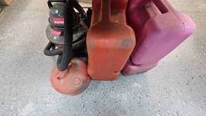 lot 171 image: 2 Boat Gas Tanks, Metal Gas Tank, and Small Shot Vac