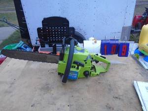 lot 109 image: Poulan countervibe 3400 chainsaw. Fires on ether. May need carb cleaning. As shown.