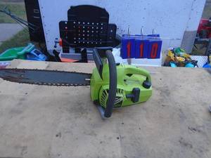 lot 110 image: Poulan super deluxe micro XX5. Used condition. Fires on ether. May need carb cleaning. As shown.