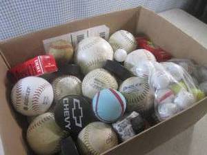lot 91 image: (EW3) Box Full of Mostly Softballs,...