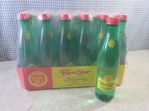 lot 143 image: (C-2) 24-Pack of Topo-Chico Twist o...