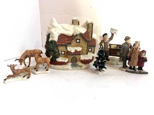 lot 58 image: 7 Unmarked Resin Christmas Village Figurines Deer, News Stand Tree House