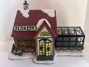 lot 59 image: 1999 St. Nicholas Square Christmas Village Florist