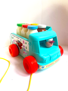lot 81 image: Vintage Fisher Price Milk Wagon Pull Toy