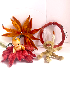 lot 89 image: 4 Antique Chenille Ornaments Sleepy eye baby, Eskimo, Poinsettia and Candle