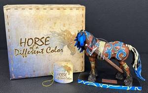 lot 39 image: Horse of a Different Color Woad Clydesdale Figurine with Box and Tag