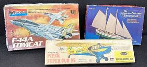 lot 54 image: Lot of 3 Vintage Model Kits - F-14A Tomcat, Gloucester Schooner, Piper Super Cub 95