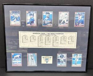 lot 59 image: Minnesota Twins 1991 World Series Champions Framed Topps Cards and Box Scores Display