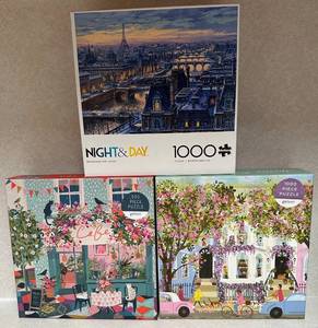 lot 74 image: Set of 3 Jigsaw Puzzles - Paris Night & Day, Afternoon Tea, Spring Terrace