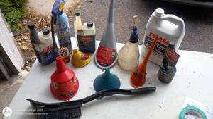 lot 36 image: Automotive Maintenance Lot with Funnels, Antifreeze, and Fluid Treatment