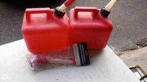 lot 45 image: Pair of 5-Gallon Red Gasoline Containers with Replacement Spout and Vent Kit