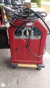 lot 55 image: Lincoln AC 225 Amp Arc Welder with Cables and Clamps