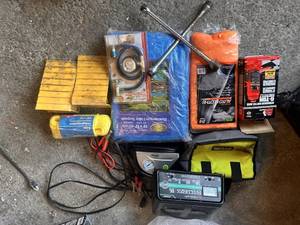 lot 61 image: Automotive Emergency and Maintenance Kit with Tools, Cables, and Battery Charger