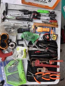 lot 64 image: Collection of Hand Tools Including Wrenches, Pliers, and Utility Knives