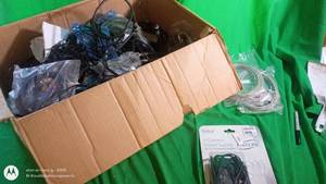 lot 134 image: Box of Security Camera Cables, 4-Camera Power Supply, and Accessories
