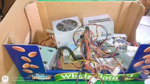 lot 135 image: Lot of Used Computer Power Supplies and Cables