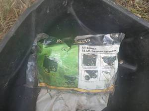 lot 148 image: Used All Season 85 lb Broadcast Spreader with Yellow Handle