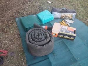 lot 153 image: RV and Outdoor Utility Equipment Lot with RhinoFLEX Sewer Kit, Tarps, and Accessories
