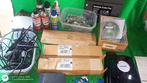 lot 175 image: Lot of Computer Cables, Adapters, Cleaning Sprays, Notebook Cooler Pad, and EmployeeManager Cards