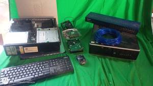 lot 178 image: Lot of Computer Hardware HP Desktop, Switch, Fans, Hard Drives, Cables, Keyboard, Mouse