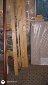 lot 221 image: Assorted Construction Materials Including Lumber, Copper Pipe, and Drywall Panel