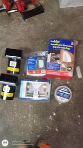 lot 229 image: Assorted Home Hardware Items Including Dryer Vent Kit, Brackets, and Tape