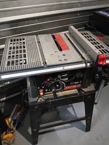 lot 1004 image: Craftsman Table Saw Model 137.218760 with Stand