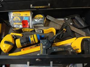 lot 1006 image: Stanley Hand Tool Collection with Tape Measures, Stapler, and Saw