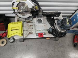 lot 1031 image: Ryobi Circular Saw, Ryobi Router, and Portable Table Saw with Accessories