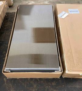 lot 12 image: Box of 25 23x47 Inch Reflective Ceiling Tiles