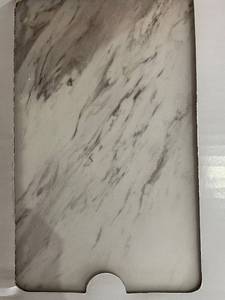 lot 51 image: 7 Boxes TrafficMaster Carrara Marble Peel & Stick Vinyl Tile, 12x24 in