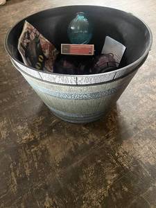 lot 148 image: Large Outdoor Planter Pot with Hummingbird Feeders and Garden Decor Assortment