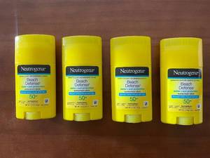 lot 221 image: Lot of 4 Neutrogena Beach Defense SPF 50 Sunscreen Sticks 1.5 oz