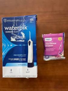 lot 224 image: Waterpik Cordless Water Flosser with Tips and Equate Interdental Brushes