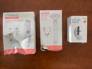 lot 237 image: Visage Facial Cleanser, Electric Facial Roller, and Hoygi Facial Pack Set